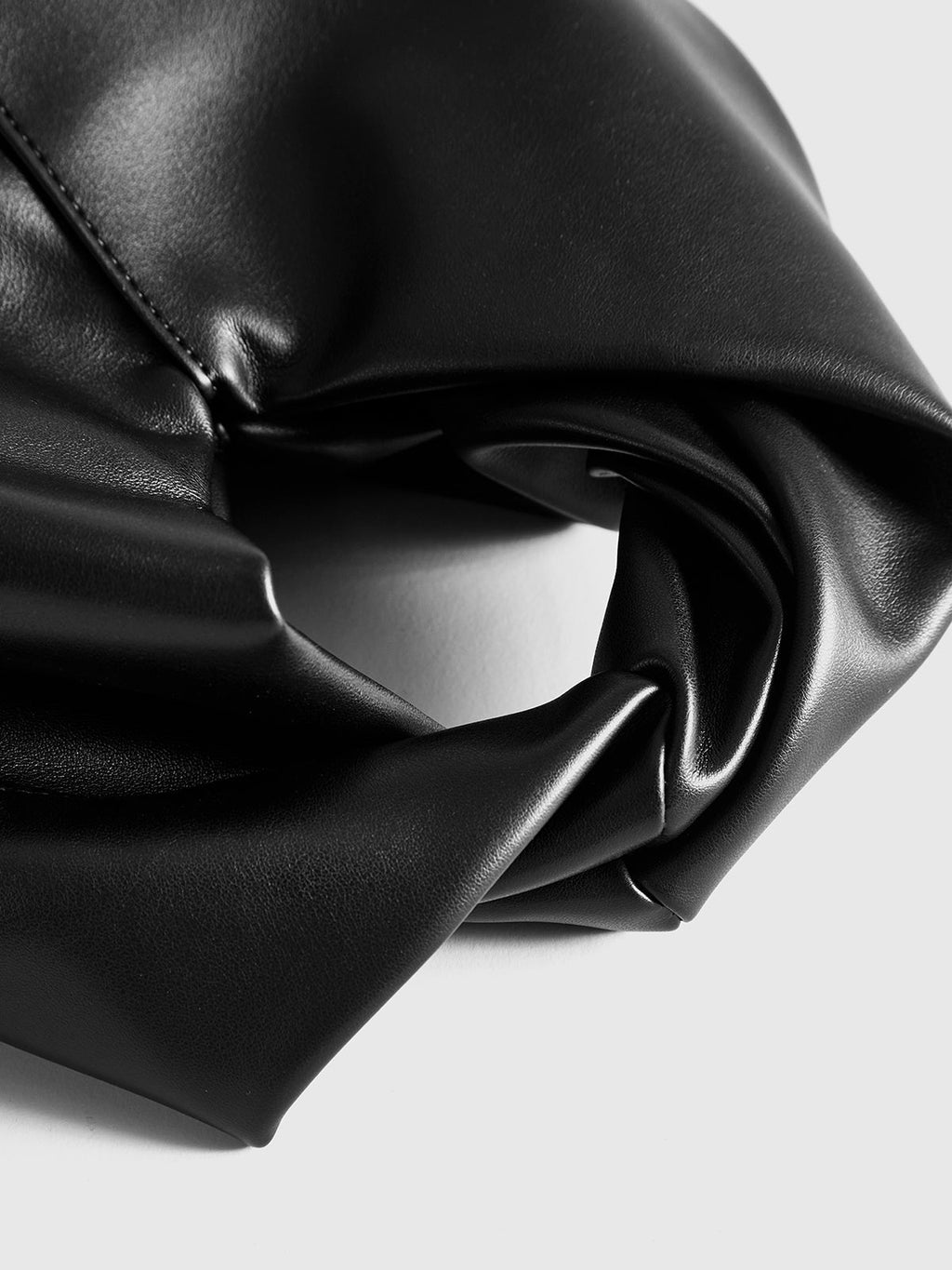 Black Handbag with Twisted Top Handle